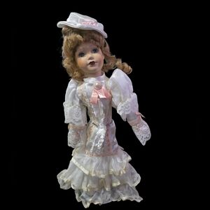 Elegant White and Pink Porcelain Doll